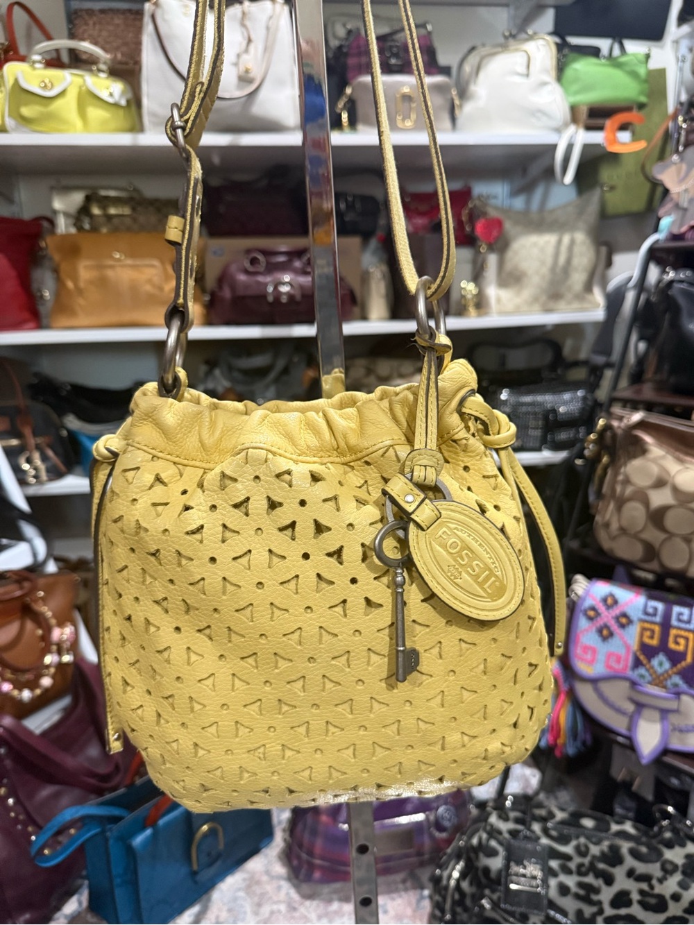 Fossil Vintage Yellow Perforated Drawstring Crossbody Bag